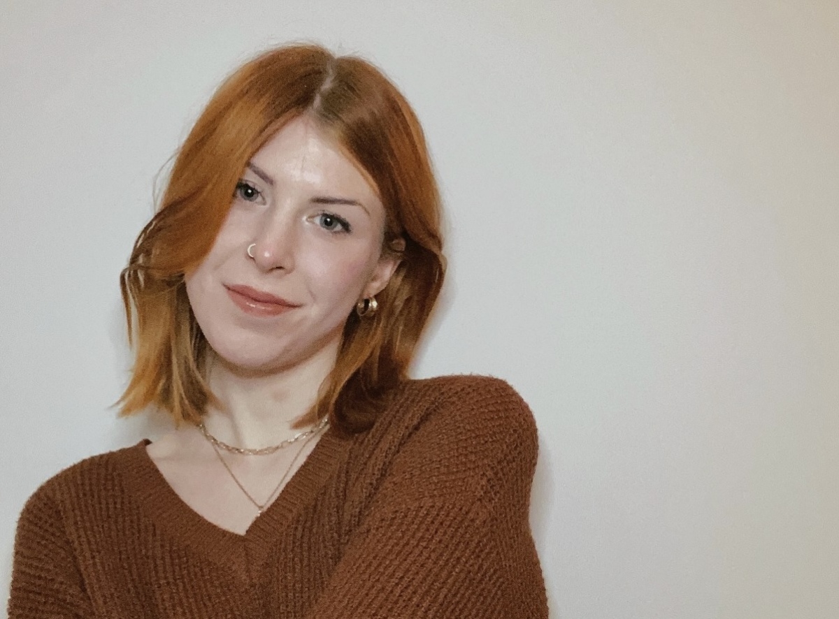 Portrait of a white woman looking at the camera 